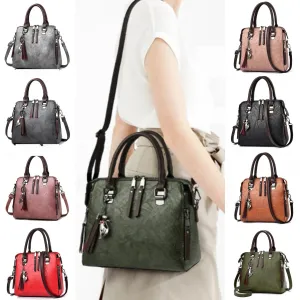 Sophie  Vintage Handtasche aus veganem Leder mit Fransen und Obergriff