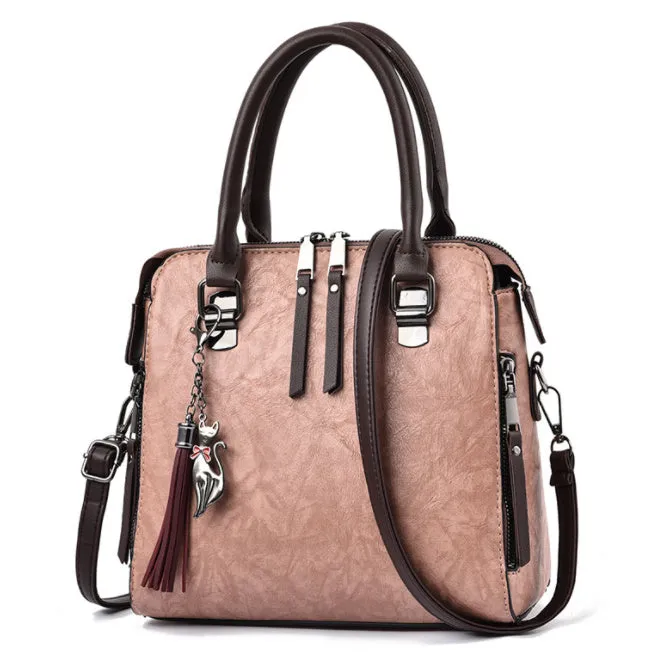 Sophie  Vintage Handtasche aus veganem Leder mit Fransen und Obergriff